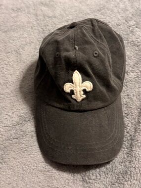 Adams Black Baseball Cap with Cream Fleur-de-Lis Patch